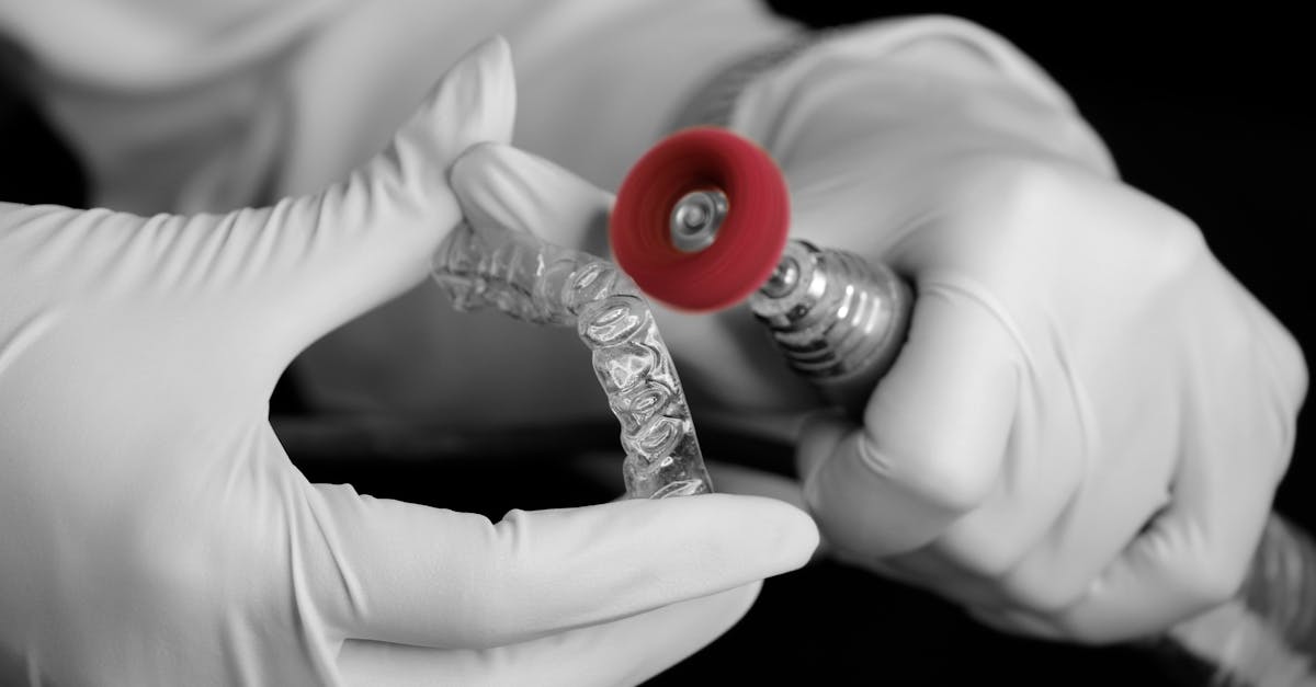 close up of a dental technician making an invisalign